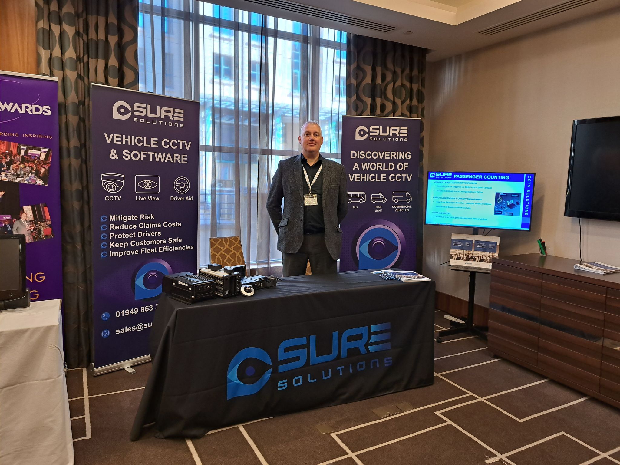 SURE vehicle technology display at an industry event